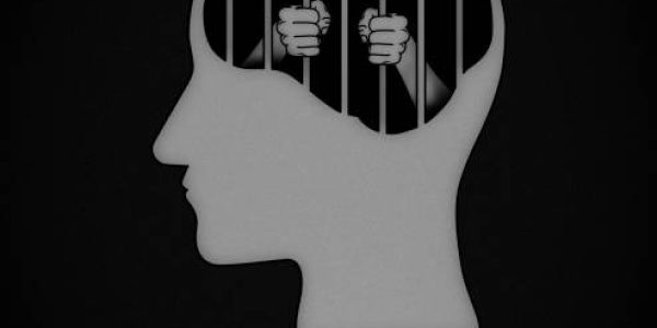 brain concept with copy space for design. Pessimistic, disappointed, suffer, anxiety, depression feeling concept. hands holding prison bars in a head.